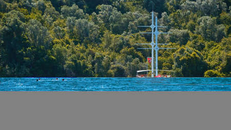 People swim on the lake Balaton.