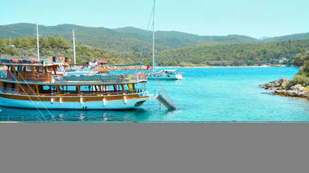 Tourist boats in the bay of Kefalonia, Greeceの写真素材