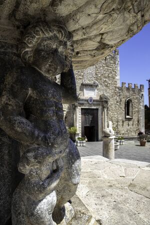 Parto of the fountain in Piazza Duomo in Taorminaの写真素材