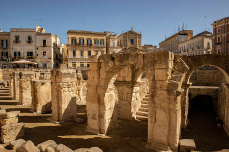 The ruins of Ancient Roman Amphitheater in Lecce which is called the Florence of South, in Apulia, Italyのeditorial素材