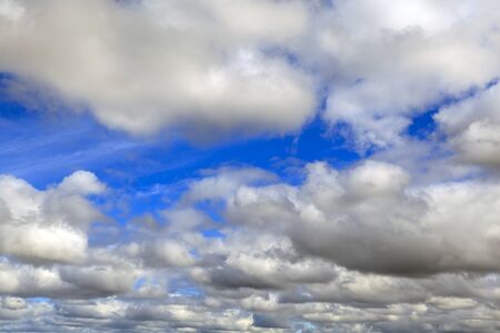 blue sky background with white cloudsの写真素材