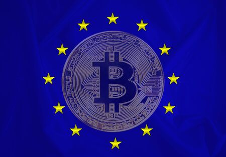 Finance concept, Bitcoin on the background a Flag  of European Union , bitcoin control, bitcoin in a caliper, a board with a trend of crypto currencyの写真素材