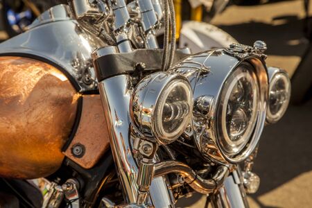 Chromed headlamp of a  motorcycle, stylish classic chrome-plated motorcycle headlight,close-up,の写真素材