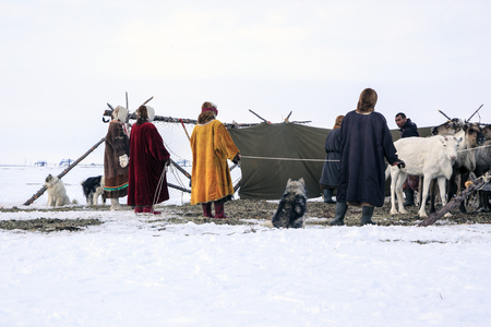 Nadym, Russia - april 27, 2018:  Yamal, open area,tundra,The extreme north,  assistant reindeer breeder, the women  in national clothes; editorialのeditorial素材