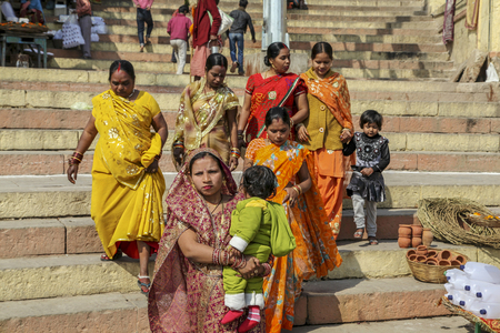Varanasi, India- March 17, 2017: The indian happy big family on the bank of the Ganges River, editorial.のeditorial素材
