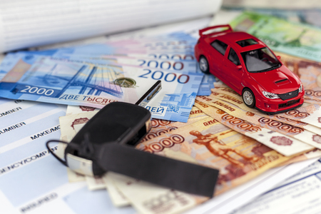 Rostov on Don, Russia, May 23, 2018: The concept of motor insurance in Russia. Compulsory Third Party / Green Slip Insurance policy,russian rubles.のeditorial素材