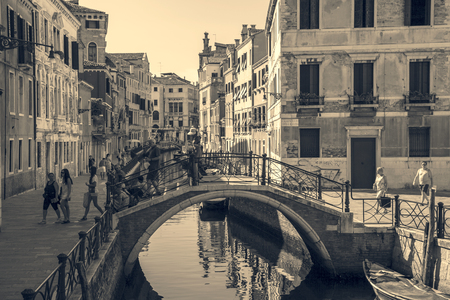 Venice.Italy. 23 August -2016:Tourists in gondolas sailing on the grand canal, toned- sepiaのeditorial素材