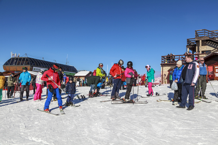 Russia, Sochi, December 01, 2017 - ski resort, instructor is teaching a young girl to ski, Opening of the ski season,editorial.のeditorial素材