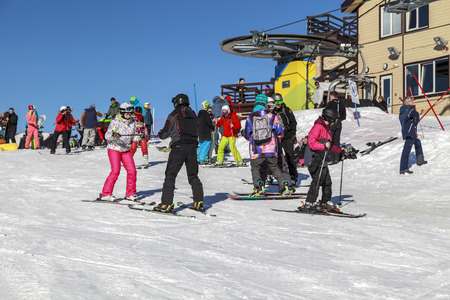 Russia, Sochi, December 01, 2017 - ski resort, instructor is teaching a young girl to ski, Opening of the ski season,editorial.のeditorial素材