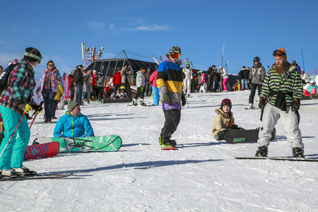 Russia, Sochi, December 01, 2017 - ski resort, instructor is teaching a young girl to ski, Opening of the ski season,editorial.のeditorial素材