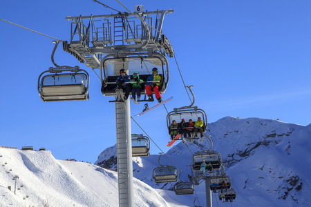 Russia, Sochi, December 01, 2017: Cableway in the mountains with snowboarders, Opening of the ski season,editorial.のeditorial素材