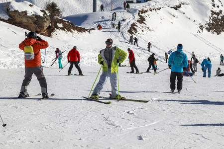Russia, Sochi, December 01, 2017 - ski resort, instructor is teaching a young girl to ski, Opening of the ski season,editorial.のeditorial素材