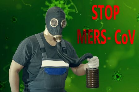 Concept of coronavirus quarantine. MERS-Cov (middle East respiratory syndrome coronavirus), Novel coronavirus (2019-nCoV), man in gas mask, green tonedの写真素材