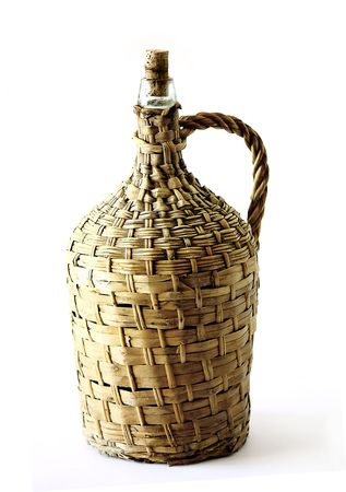 Vintage and old bamboo wine bottle isolated on a white background.の写真素材