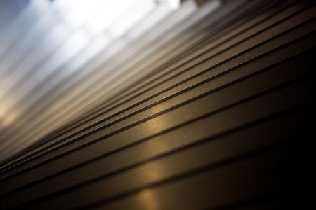 View of a high curved descending staircase.の写真素材