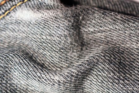 Macro view of the detail of some blue jeans.