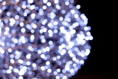 Close view of a ball of light blurred at night.の写真素材