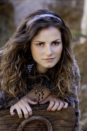 view of a beautiful woman, posing on a sensual way on a chair.の写真素材