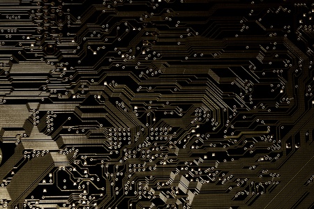 close view detail of   computer circuit chips on a golden light.の写真素材