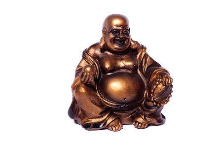 Close up view of a Buddha statue isolated on a white background.の写真素材