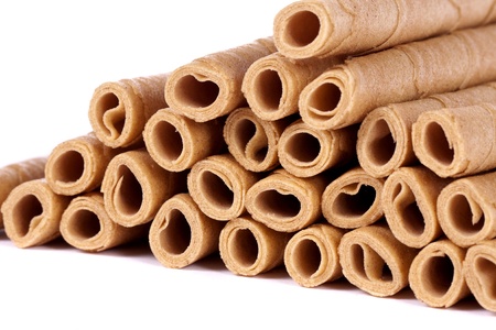 Close up view of a bunch of cookie sticks isolated on a white background.の写真素材