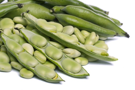 Close up view of some broad beans isolated on a white background.の写真素材