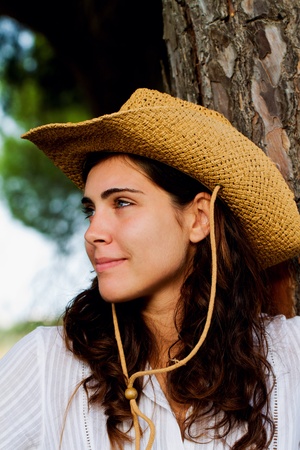 View of a beautiful young country girl with a guitar on the woods. の写真素材