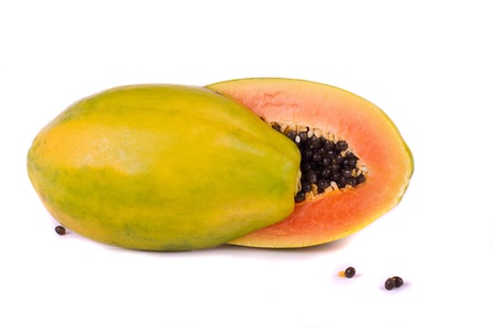 Close up view of a tropical papaya fruit isolated on a white background.の写真素材