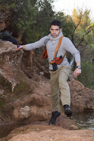 View of an treasure hunter, jungle adventurer type man.