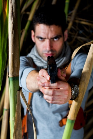 View of an treasure hunter, jungle adventurer type man.