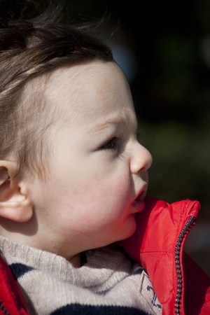 View of a young child on a urban park.の写真素材