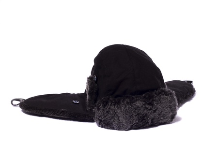 Close view of a winter fur hat isolated on a white background.の写真素材