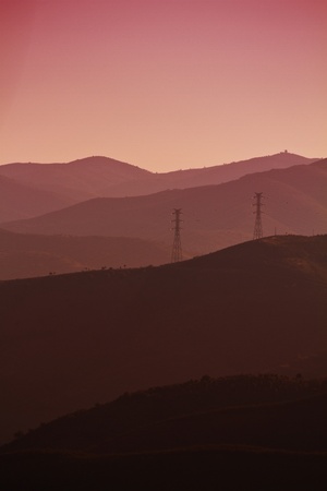 View of a eerie landscape with mountains at dawn.の写真素材
