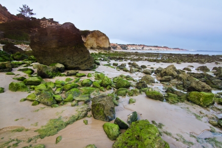 View of the beautiful coastline near Olhos D'Agua in the Algarve, Portugal.の写真素材
