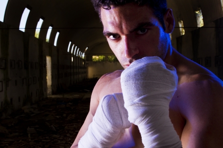 View of a fit fighter on a abandoned factory.の写真素材