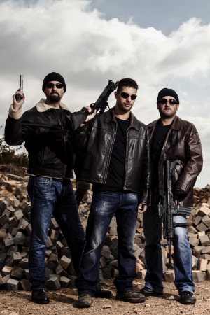 View of a group of gang members with guns.の写真素材