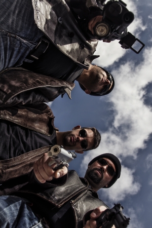 View of a group of gang members with guns.の写真素材