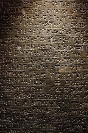 View of ancient Sumerian cuneiform writing engraved in a stone.のeditorial素材