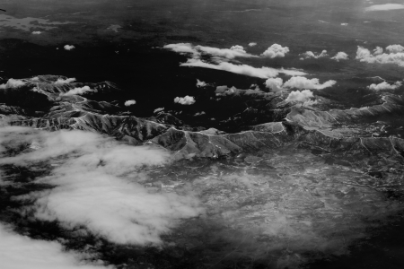 Aerial view of snowy mountains seen from a plane.の写真素材