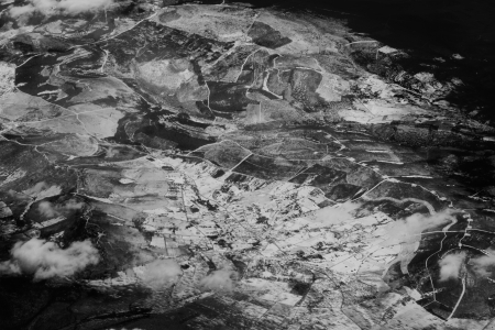 Aerial view of snowy mountains seen from a plane.の写真素材