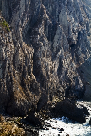 Close up view of a section of a cliff near the coastline.の写真素材