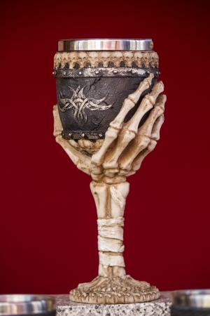 Close up view of a fantasy medieval chalice cup of wine.の写真素材