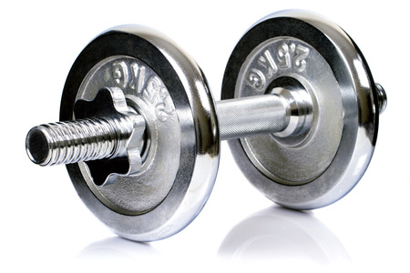 Close view of a chrome dumbbell equipment isolated on a white .の写真素材