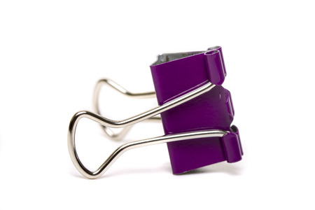 Close up view of a office binder clip isolated on a white background.の写真素材
