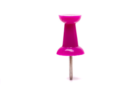 View of single purple push pin isolated on a white background.の写真素材