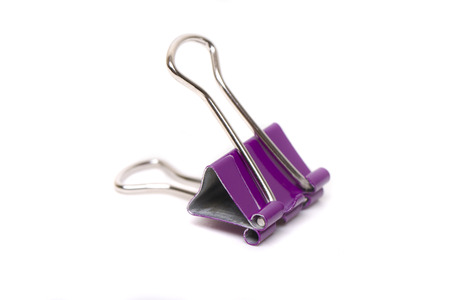Close up view of a office binder clip isolated on a white background.の写真素材