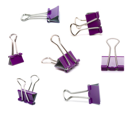 Close up view of several office binder clips isolated on a white background.の写真素材