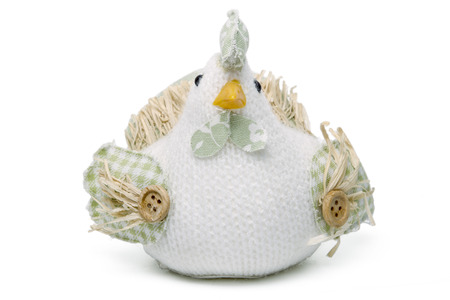 Close up view of a handmade chicken doll isolated on a white background.の写真素材