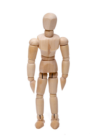 Close up view of a wooden dummy isolated on a white background.の写真素材