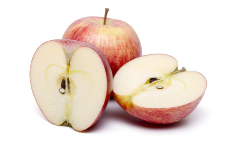 Close up view of some red apples isolated on a white background.の写真素材
